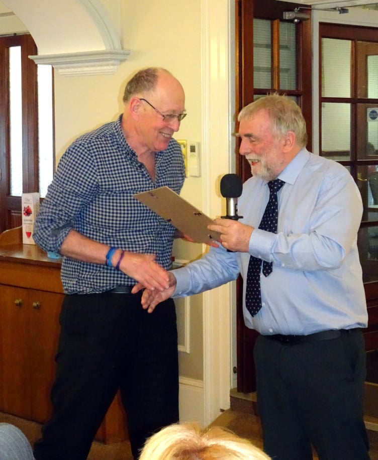 2nd Tenor Paul Varallo receives a 20yr Service Award.