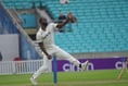 Surrey’s title hopes lifted by Kemar Roach’s return