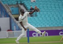 Surrey's title hopes lifted by West Indies bowler Kemar Roach's return