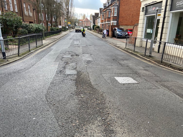 Gravel is currently strewn across the South Street/Union Road junction in Farnham town centre as a result of the road surface breaking up