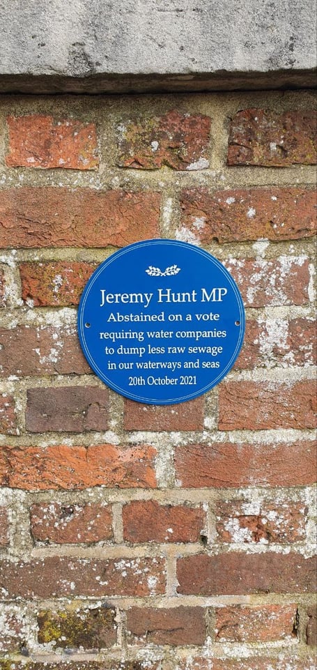 Extinction Rebellion's blue plaque dedicated to MP Jeremy Hunt in Godalming
