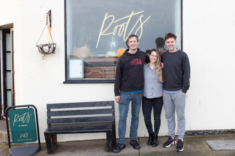 Will Senior, Ellie Dobbs and Jamie Blair in front of Roots at at The Promenade, Peel in 2021 Photo: Chris Littler
