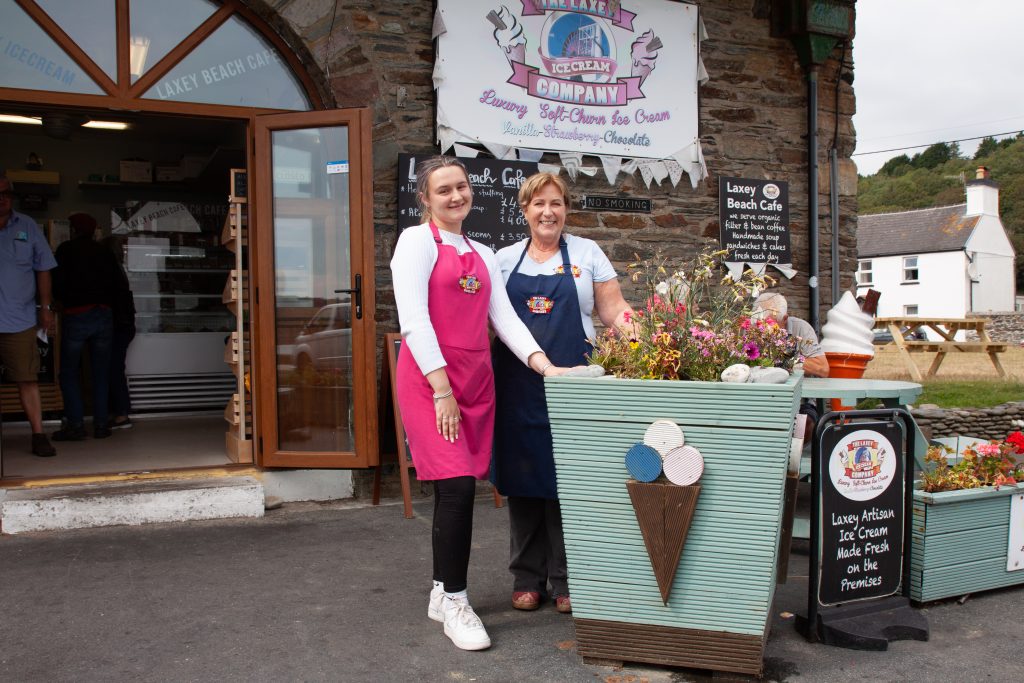 Macy Bell and Julie Pinson in front of the Laxey Beach Cafe in 2022 Photo: Chris Littler