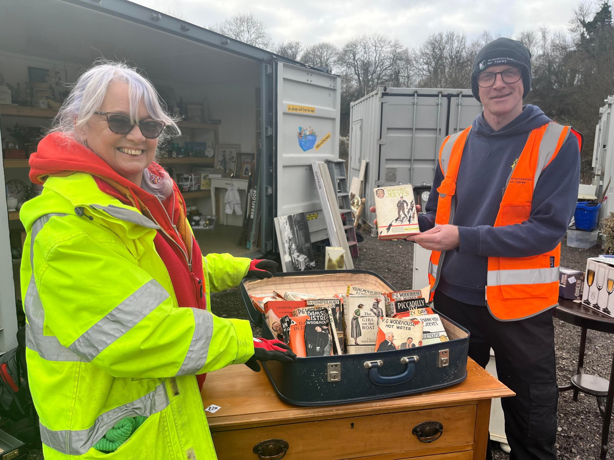 Martina Morris, who works at the reuse shop at Five Lane recycling centre and team leader Chris Williams with the books