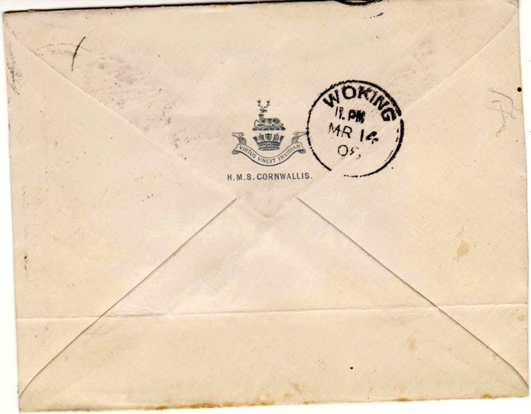 The crest and postmark which are on the back of the envelope.