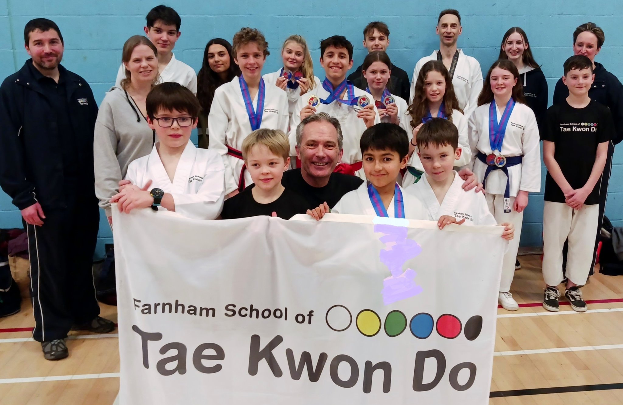 The delighted Farnham School of Tae Kwon Do squad and coaches
