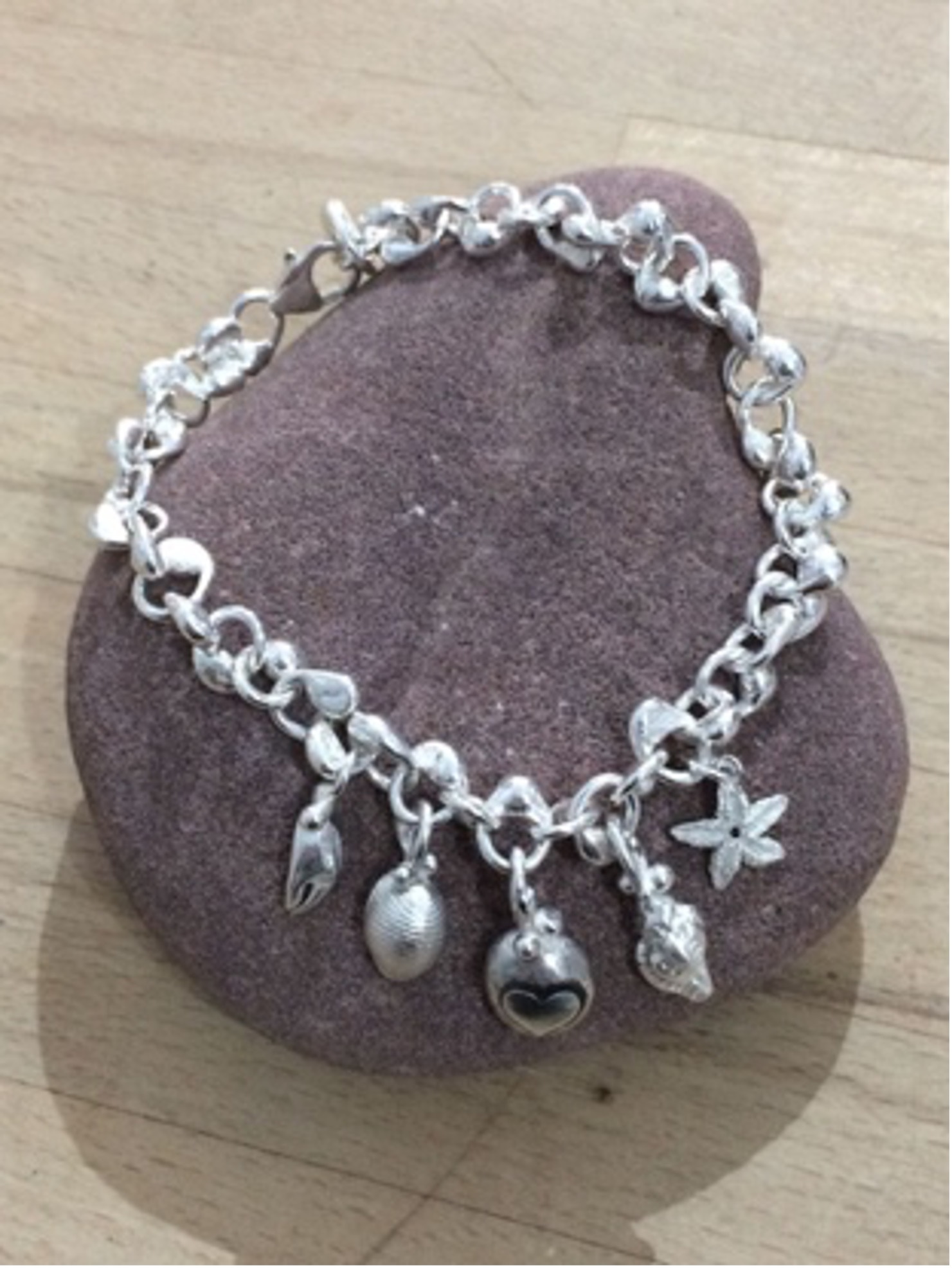 Seashore silver charm bracelet by Karen Clarkson.