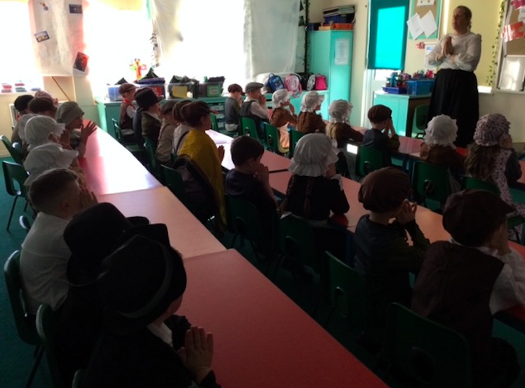 Children tried their hand at writing on chalkboards as part of the time travelling experience