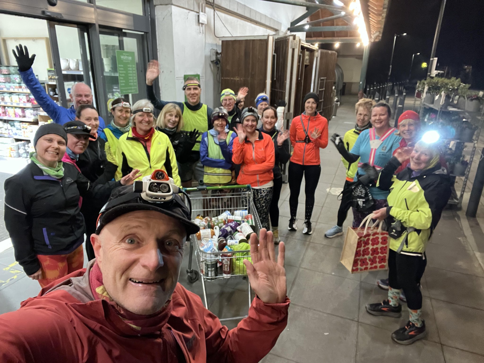 Runners with donations at Waitrose during the Food Bank Run which is taking place all over the country in February.