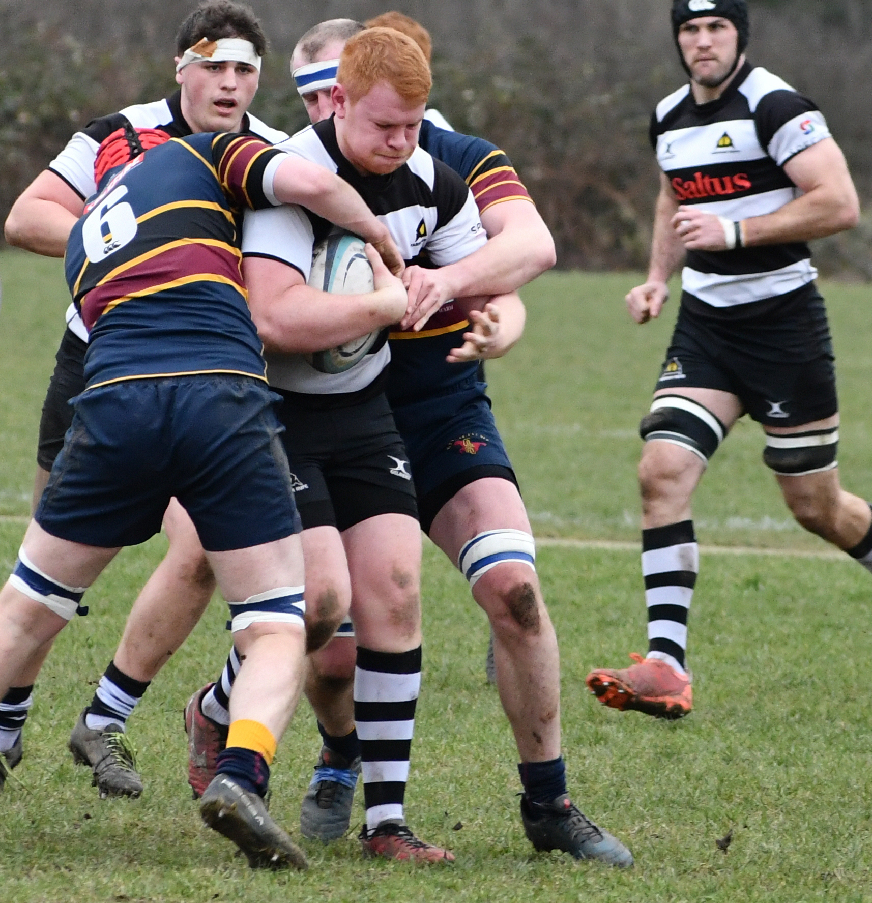 It takes two Old Colfeians players to halt Tom Dullage