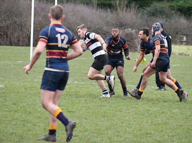 Skipper Toby Salmon breaks the line to score the bonus-point try