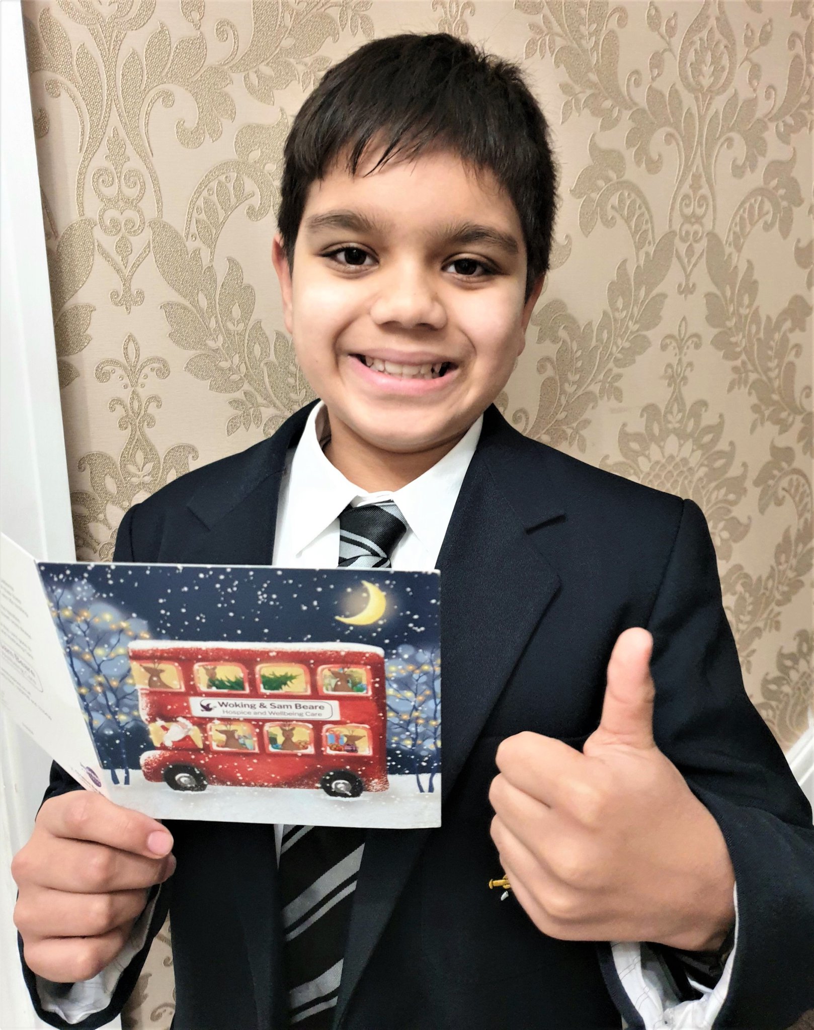 Milan Kumar with the Christmas card Eileen sent him.