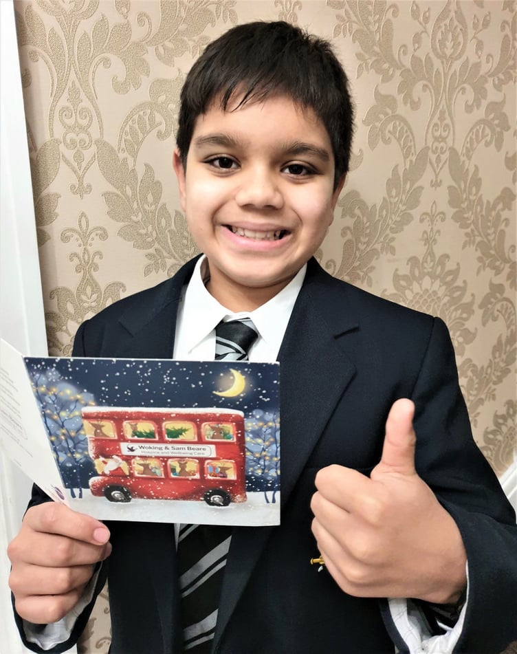 Milan Kumar with the Christmas card Eileen sent him.