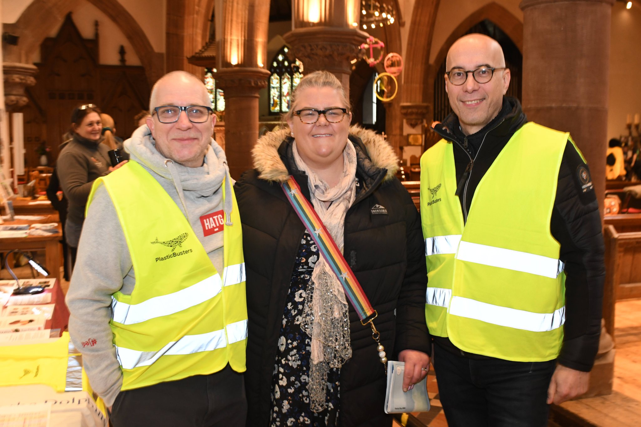 The first day of the Manx Nature Show at Peel Cathedral, presented by Manx Whale and Dolphin Watch - John Rispin (left) and Jaime Amoedo (right) of Plasticbusters with Clare Barker MHK