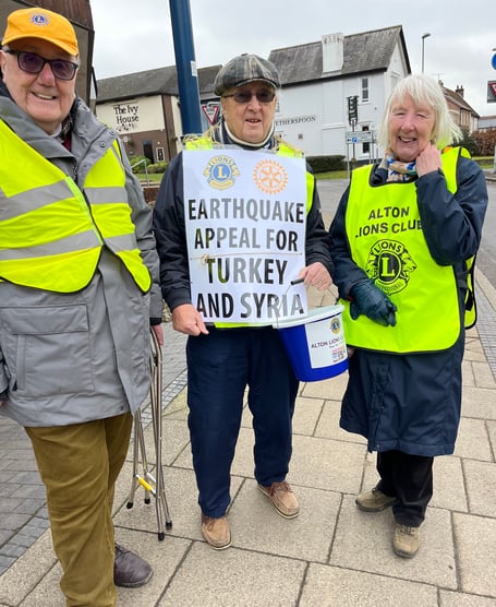 From left: Alton Lions Peter Baker and John Partridge with supporter Annette Blackman collect in Alton High Street for the Turkey/Syria earthquake appeal, February 17th 2022.