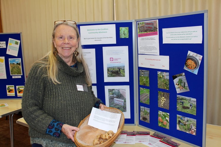 Holding a trug that had been full of Jerusalem artichokes at the start of the morning is Christina Dymond of Crediton Community Allotment. SR 6983