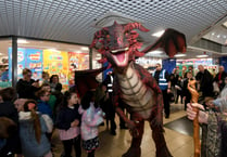 Shoppers get a fright from dragon and friends