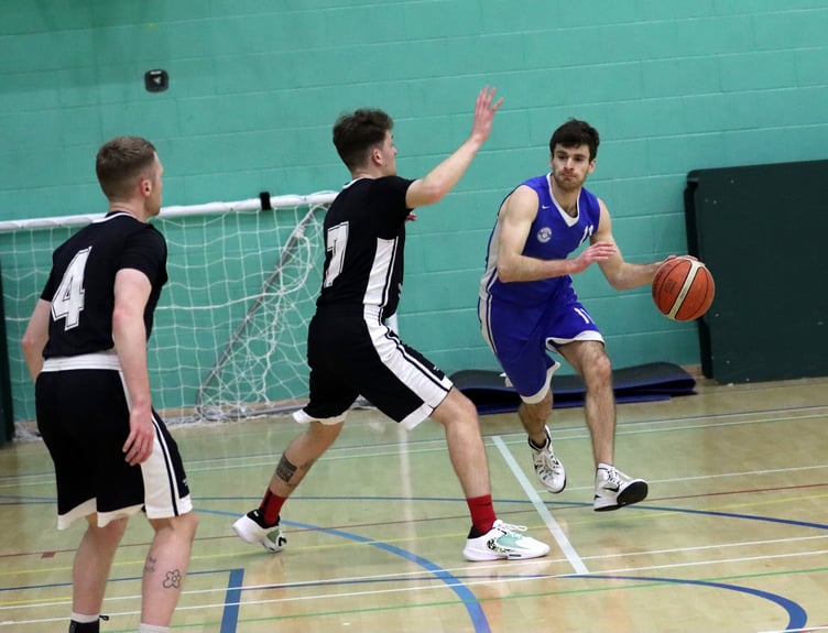 Action from the Wolves versus Jets clash in Isle of Man Basketball Association’s Senior League at the National Sports Centre on Thursday evening. It was Wolves who came out on top, winning 79-55 (Photo: Kyle Furlong)