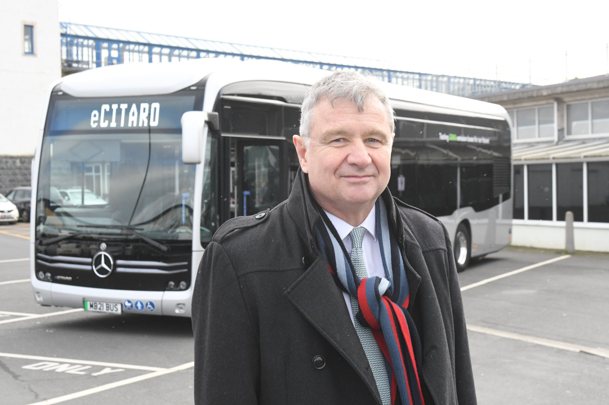 A zero emission Mercedes ‘eCitaro’ electric bus being tested on the island’s roads - pictured is Infrastructure Minister Chris Thomas