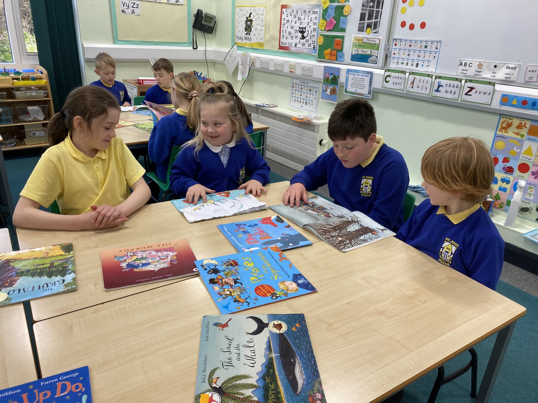 St John's School pupils ran a book exchange and children of different ages read their favourite books together in shared reading sessions