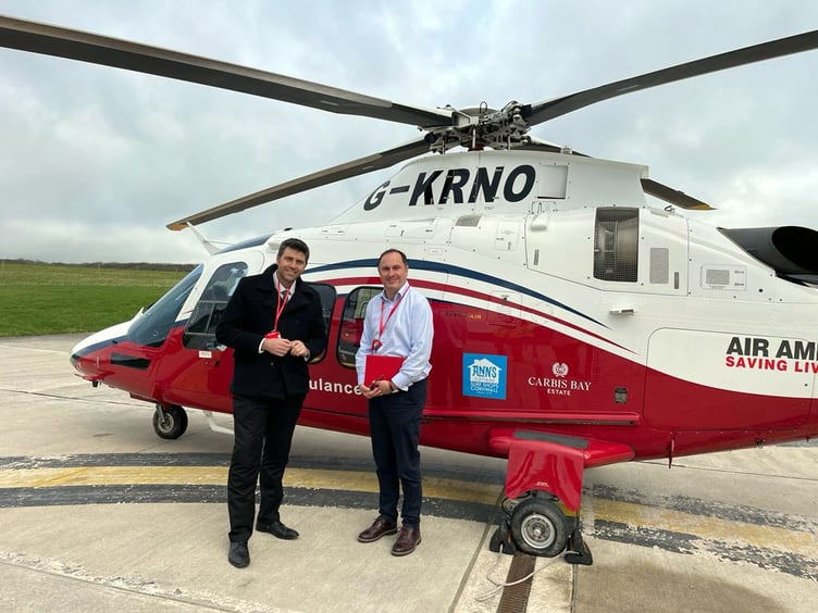 ABOVE: Scott with the Air Ambulance CEO; Below, Scott with Bude’s Cllr Shorne Tilbey