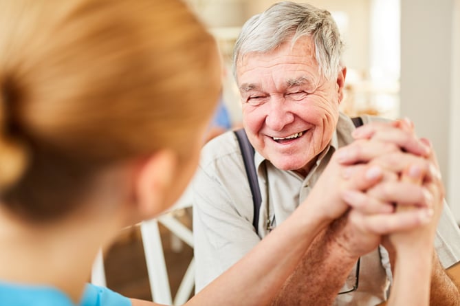 Old man gets comfort and hope from a nursing wife and is happy