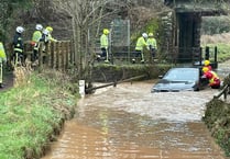 Firefighters rescued person from car in flood near Crediton
