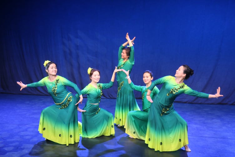 The Chinese Ladies Group perform.