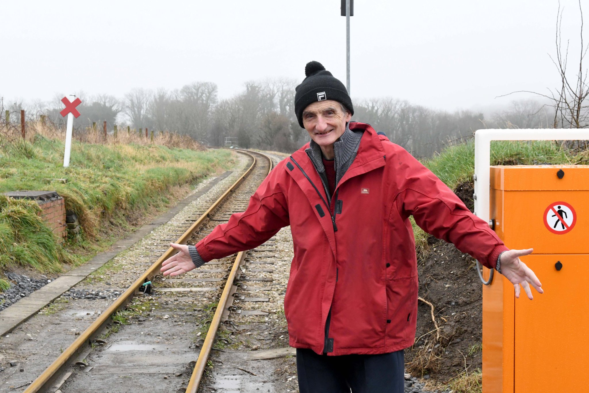 Ian Ellis at the Ballastrang crossing, the last road crossing on the Isle of Man Steam Railway network to be automated -