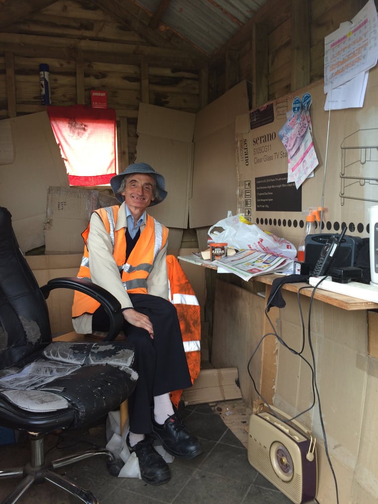 Ian Ellis in his hut at Ballastrang Crossing