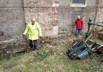 Volunteers spruce up church grounds