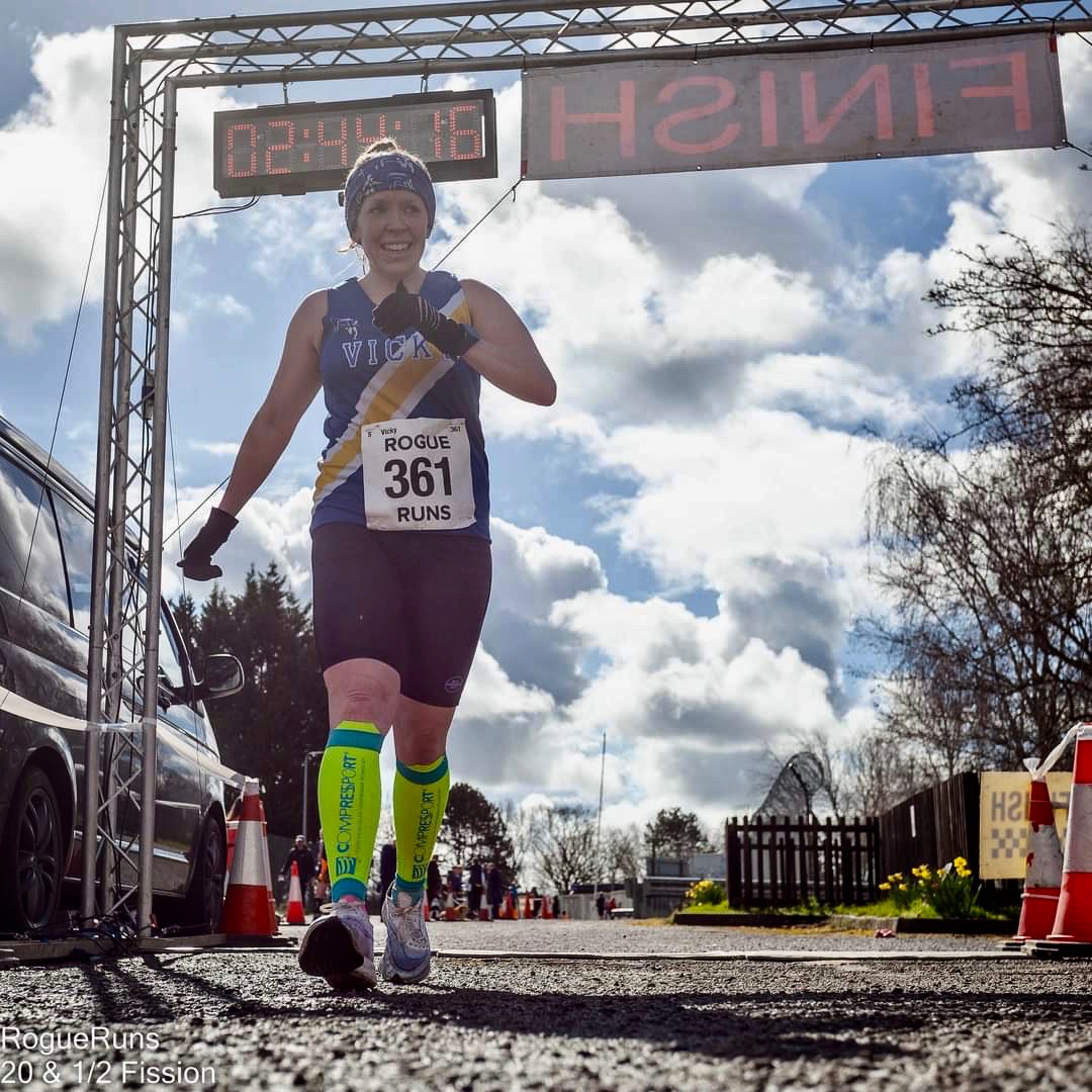 Vicky Roberts crosses the line