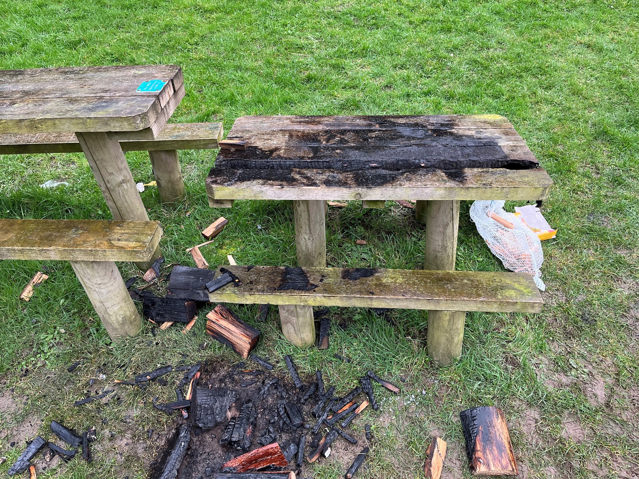 The wooden bench that was set fire to in Glen Wyllin Campsite