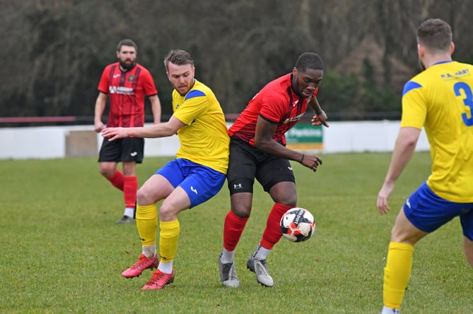 Paul Agbeseyi in action for Petersfield Town against New Milton Town