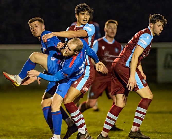 Action from Badshot Lea's 4-0 win against Raynes Park Vale