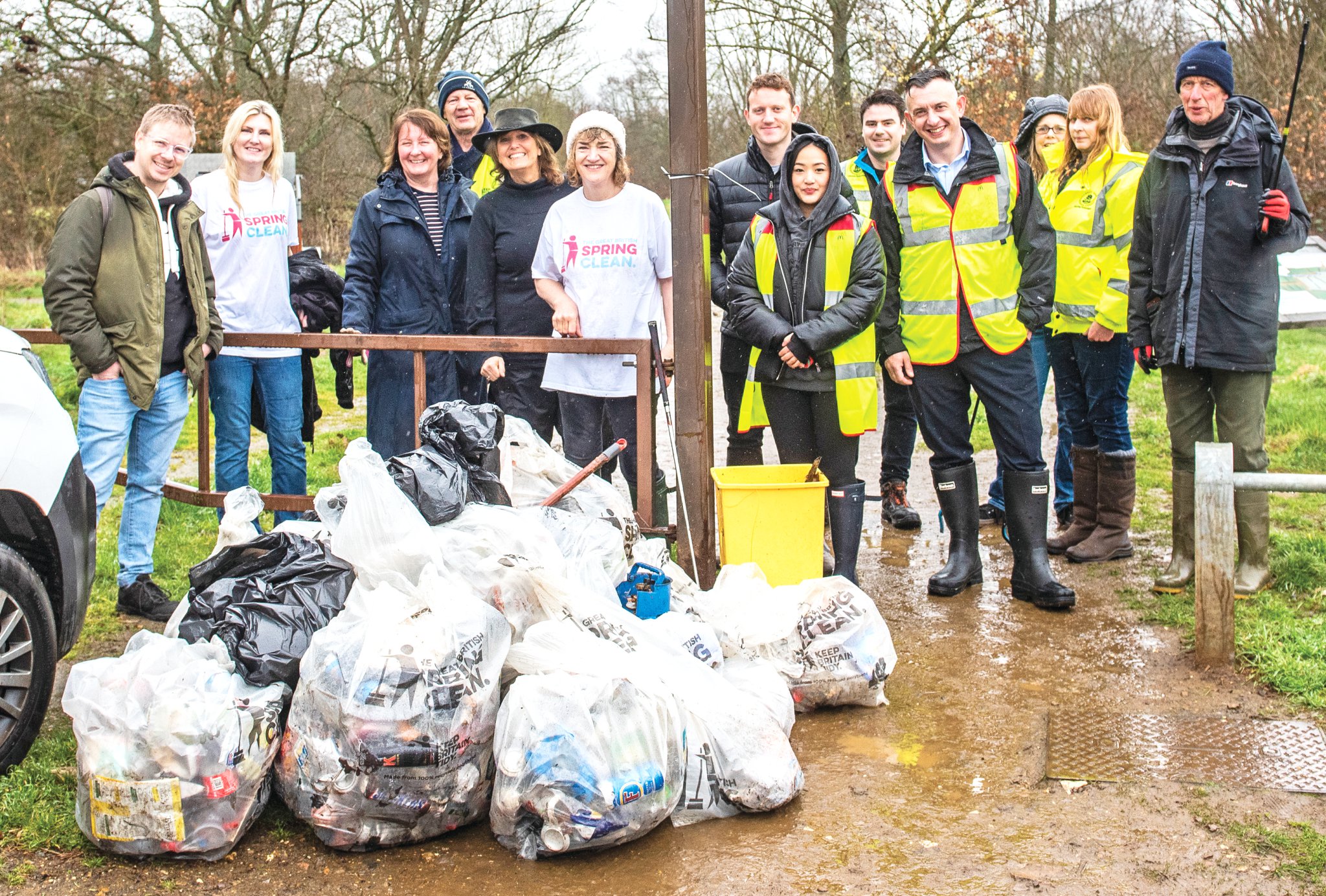 Philippa Anderson is pictured, top left centre, with litter pickers and some of the bags of rubbish collected.