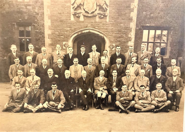 Tenant farmers gather to pay their rents at Dunster Castle in 1933