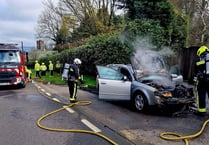 Pictures of car severely damaged in fire on A38 this morning