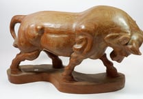 More people attend auctions to see goods for themselves