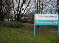 Woman hit by car outside Royal Surrey Hospital dies