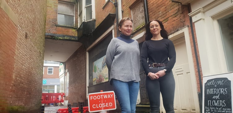 The bay window causing safety concern in Cornhill, Wellington, can be seen behind business owners Sharon Davis (left) and Tamsin Fuller.