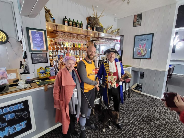 Tim Jones and Monty with Watchet Deputy Mayor Cllr Loretta Whetlor and town crier David Milton.