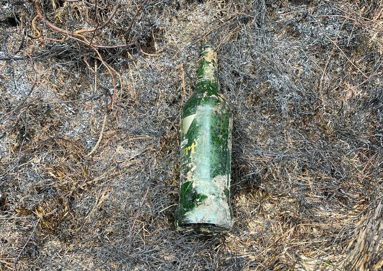 The discarded bottle which is believed to have sparked the fire in Haldon Forest. Picture: Middlemoor Fire Station