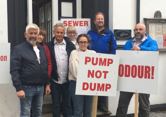 Protesters outside of Garff Commissioners offices regarding the sewage treatment plant