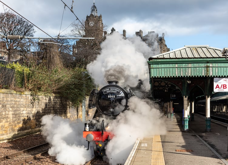 Flying Scotsman departs Edinburgh Waverley station.