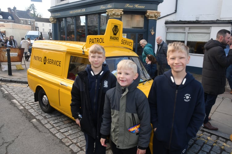 Dylan, Leo and Zack Fisher with a Hillman AA van.