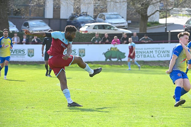 Lamar Koroma volleys Farnham Town in front against Camberley
