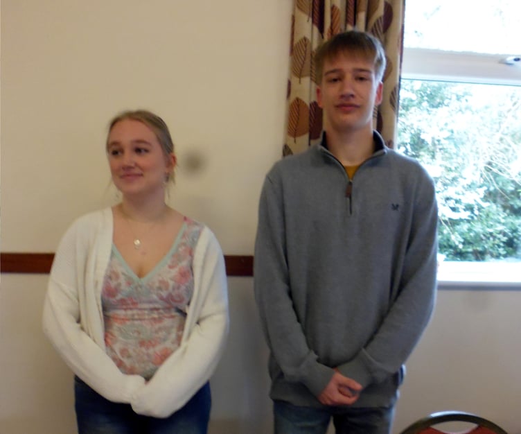 Millie and Ned are raising money to fund their school trip to Sri Lanka in July. They are pictured behind the cake stall.
