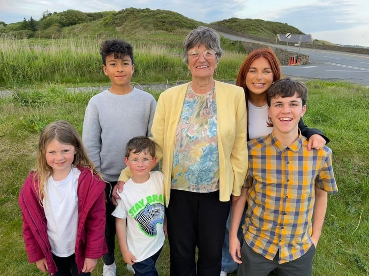 Margaret Kennaugh and her grandchildren, Reuben, Margaret, Emily