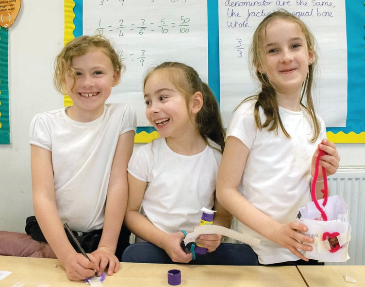 Sophie, Hallie and Scarlett enjoying Science Week.